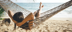 Person laying out by the ocean